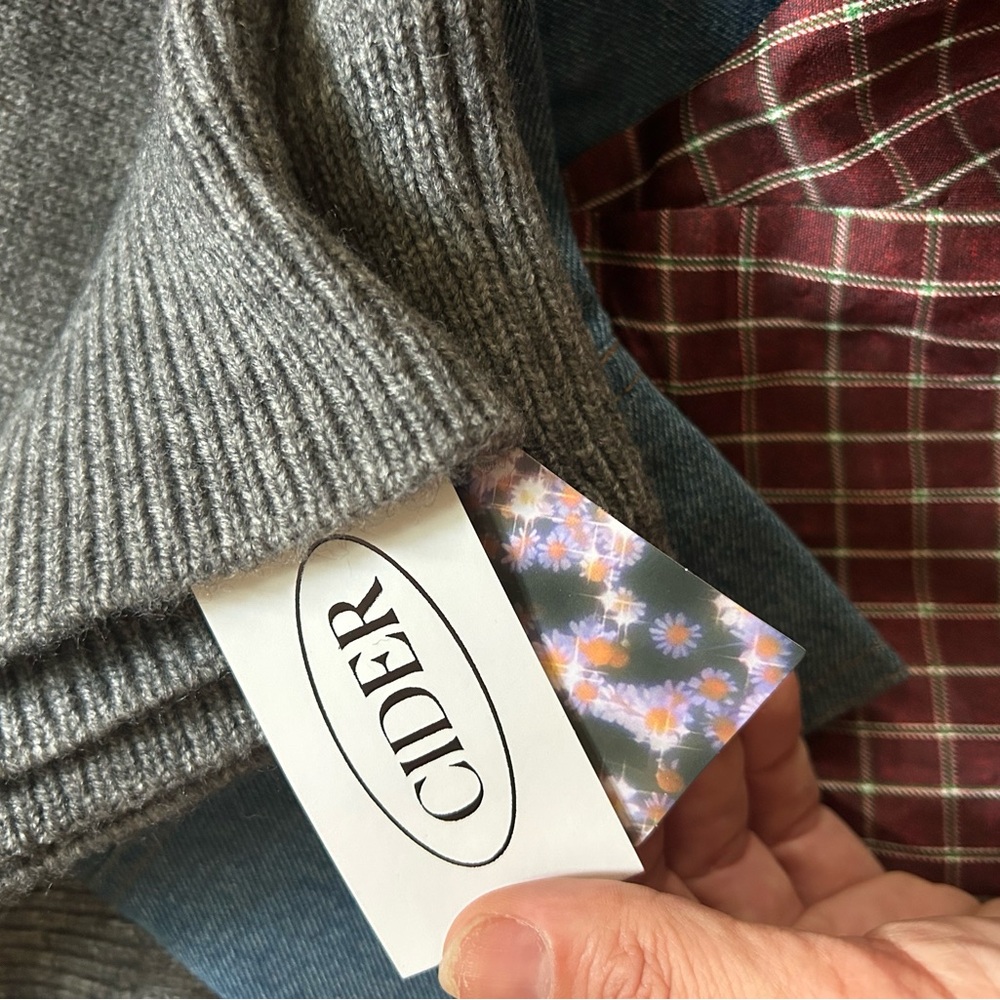 CIDER Heather Gray Knit Sweater Top with denim sleeve and plaid button sleeve.